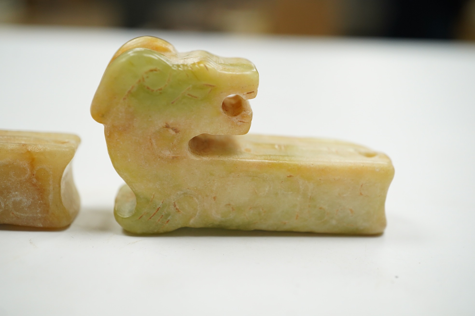 Two Chinese jade carvings in the form of animals, both 5cm high. Condition - good